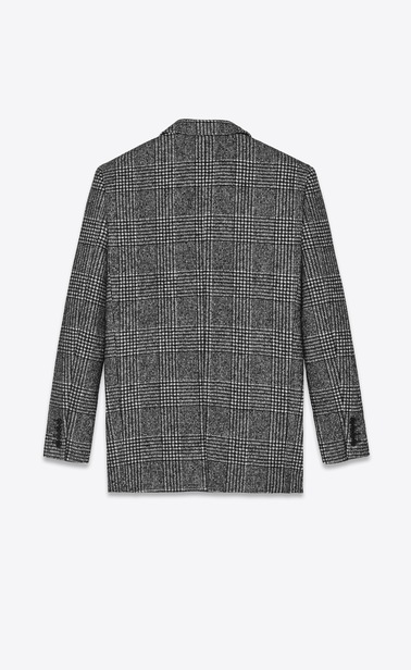 Jacket with glen plaid print in black and white.